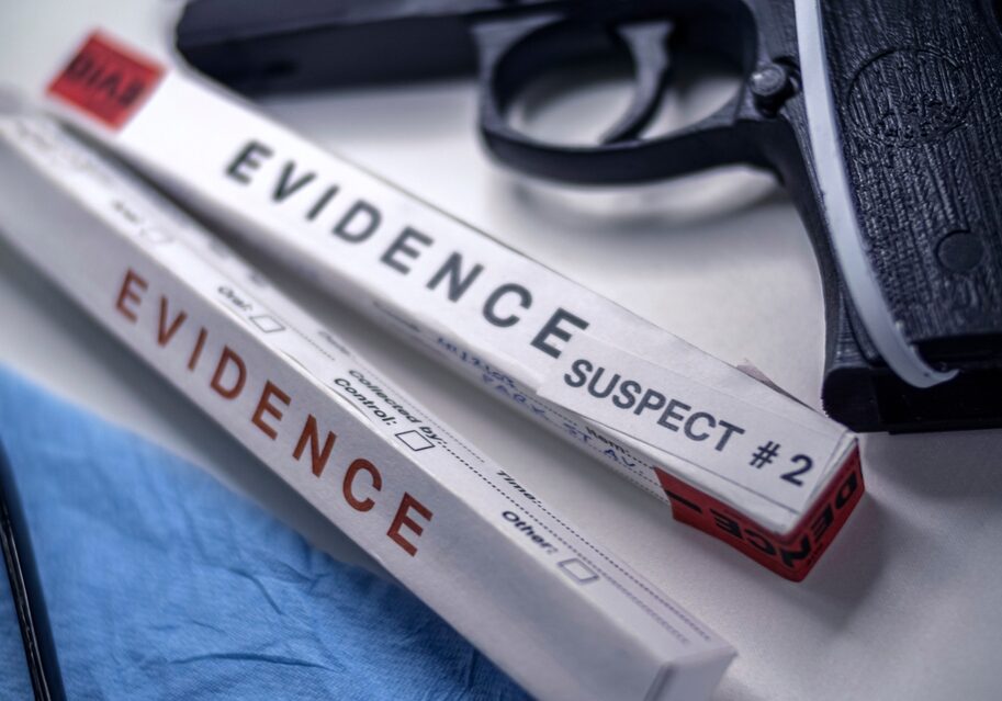 Sealed,Gun,In,Crime,Lab,Next,To,Dna,Evidence,,Crime