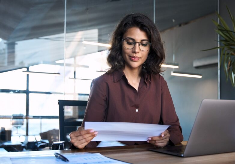 Focused,Latin,Hispanic,Young,Business,Woman,Working,On,Laptop,Computer